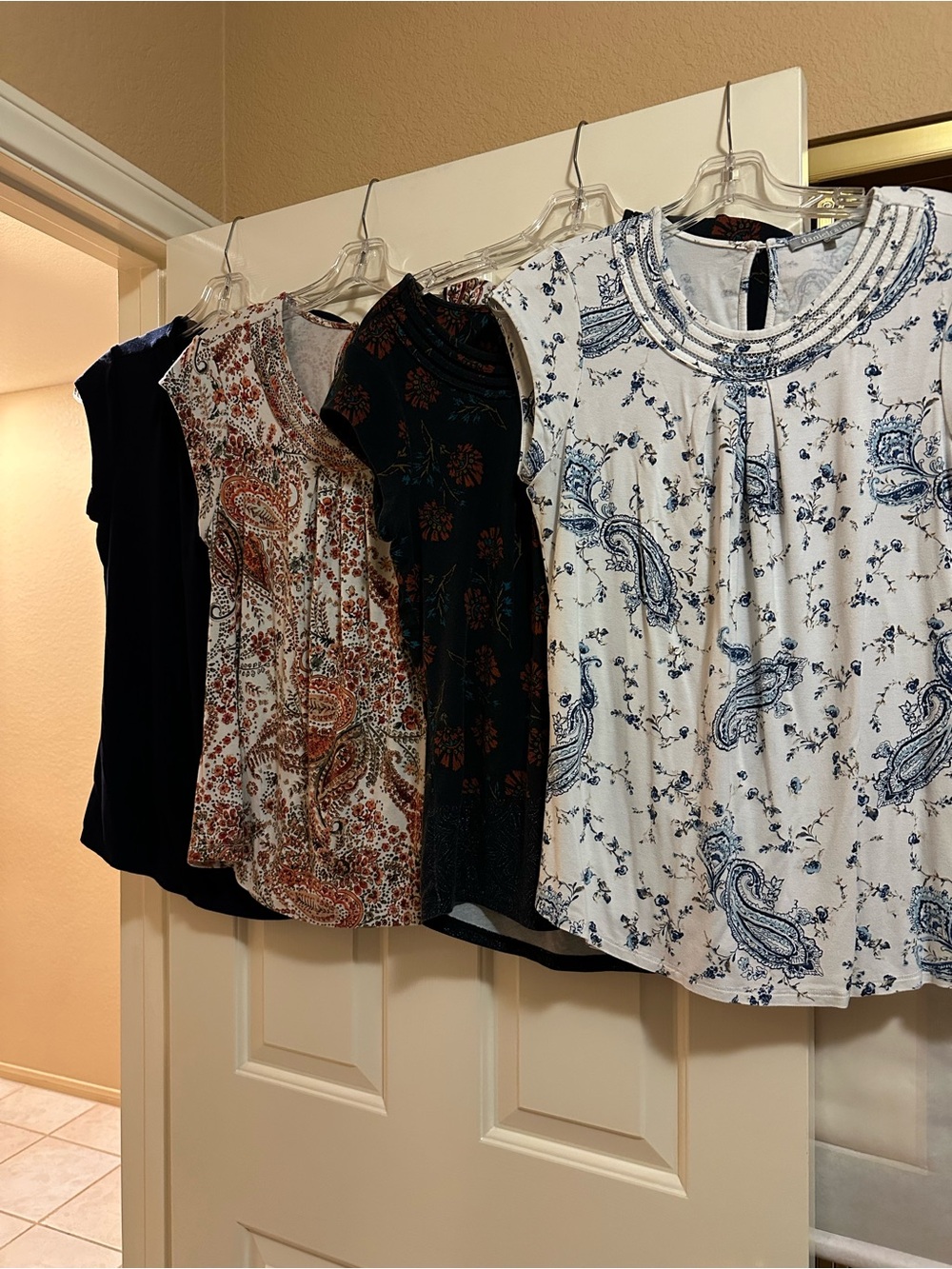 Four Daniel Rainn tops size medium
